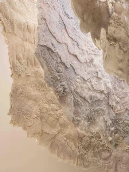 Another detail of the layered textiles in the 'Sleep Sense' installation. The soft, hand-stitched mul fabrics and felted wools create a warm, cozy, womb-like space that alludes to a pure and stress-free sleep.