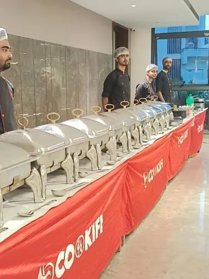 A long buffet line prepared for a house party, showcasing our ability to serve a large number of guests efficiently.