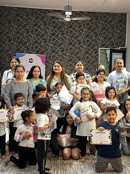 The whole gang! Another group of proud graduates from our kids' summer camp. It's a joy to see so many happy faces in one frame.