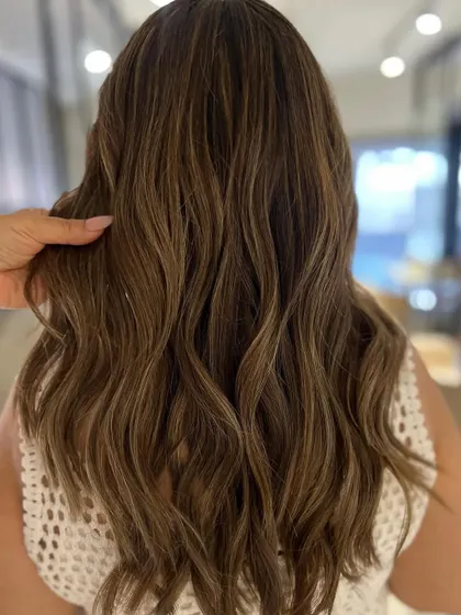 A closer look at the beach blonde summer highlights, showing the detail and blend of the foil work.