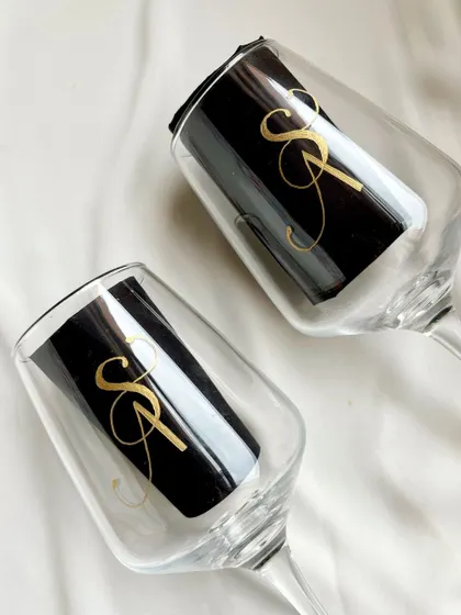 Every celebration calls for a pair of personalized wine glasses. I was delighted to add this elegant "SA" monogram and a special date to a pair of glasses, creating a perfect keepsake for the couple.