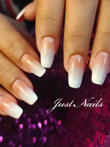 Another beautiful example of the ombre French manicure on coffin-shaped nails. The soft gradient effect provides a modern update to the classic French look.
