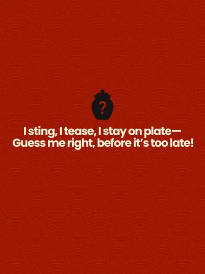 Another clue for our riddle: "I sting, I tease, I stay on plate. Guess me right, before it's too late!" It's our fiery stuffed red chilli pickle.