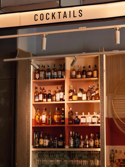 The cocktail section of our bar, fully stocked and ready for our mixologists to craft your perfect drink.
