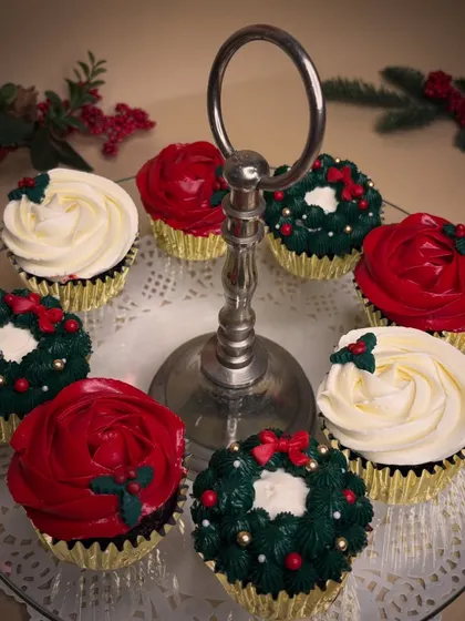 My classic Christmas cupcakes come in chocolate and vanilla, topped with vanilla bean frosting. I decorate them to look like little wreaths and poinsettias, making them almost too pretty to eat.
