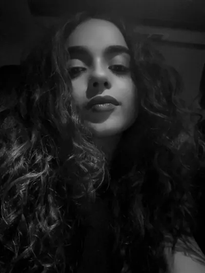 A close-up, black and white self-portrait with intense lighting. It's raw and direct, reflecting the "no filters" honesty I bring to my music and my events.