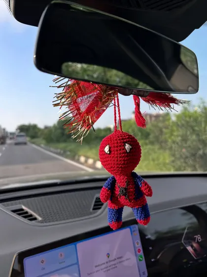 A closer look at our mini Spiderman car charm. You can see the detailed stitch work on his mask and suit. It’s completely handmade and designed to be a sturdy, long-lasting car accessory.