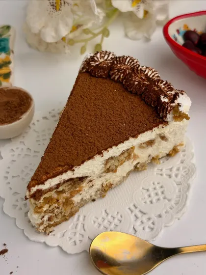 Another angle of the perfect Tiramisu slice, showcasing its creamy texture and rich layers. This is one of my personal favorites to make and eat.