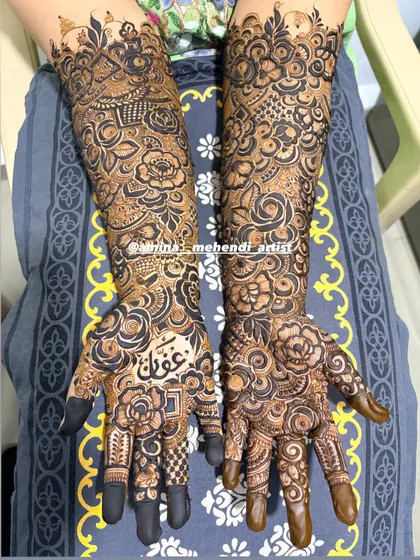 This is an example of my signature full-arm floral mehendi. I love creating dense, intricate patterns with elements like roses, paisleys, and detailed fillers to give you a rich and traditional look for any celebration.