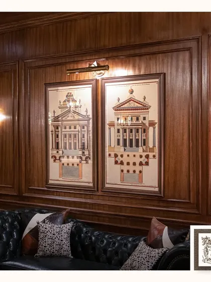 For a touch of classic architectural beauty, I chose these 'Palladio Facade' prints. Set against a rich, wood-paneled wall, they bring a sense of history and sophistication to this library or study.