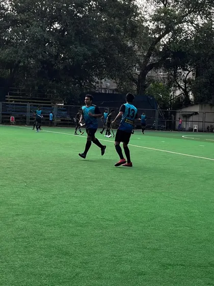 Two of our players coordinate an attack during a tournament match. Teamwork and communication are at the heart of our on-field strategy.