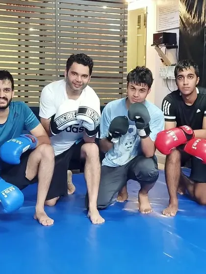 Sweat, grit, and glory. The men of the Dynamic Squad after a grueling Muay Thai and kickboxing session.