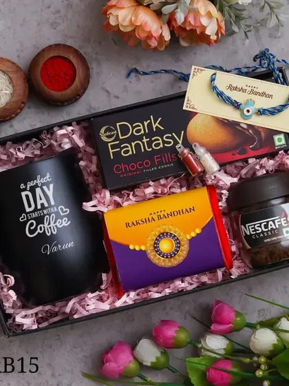A Rakhi gift hamper for the coffee lover, including a personalized mug, coffee, cookies, and a rakhi.