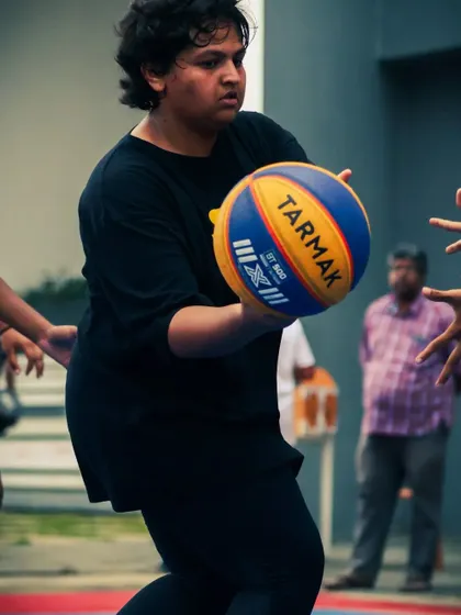 A player focuses intently, ready to make a pass or take a shot. I nurture this level of concentration and readiness in all my basketball programs.