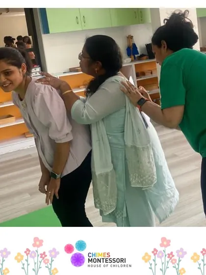 We foster a community of passionate educators. Here, teachers participate in a team-building activity.