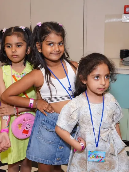 Posing for the camera at a friend's birthday party. Our space is perfect for kids to celebrate, play, and make wonderful memories together.