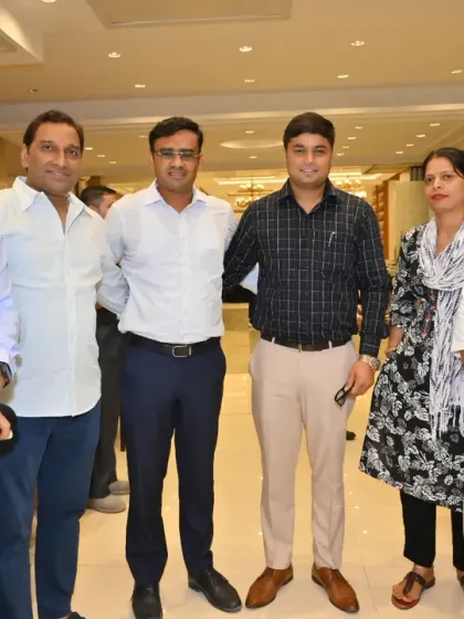 With both male and female colleagues at an event. Our strength lies in our diversity and unity.