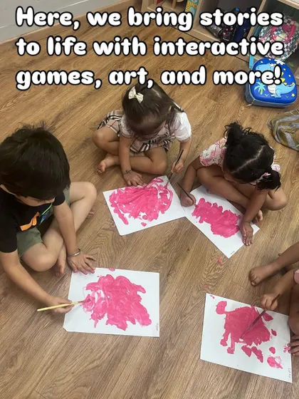 I bring stories to life with interactive games, art, and more. Here, children are painting together after a story, translating what they heard into their own creative expression.