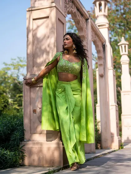 New pieces in now. This lime green dhoti saree is a modern and stylish choice for a mehendi or day event.
