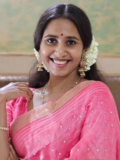 A simple portrait in a pink saree, taken by my mother. Her support and encouragement mean the world to me.