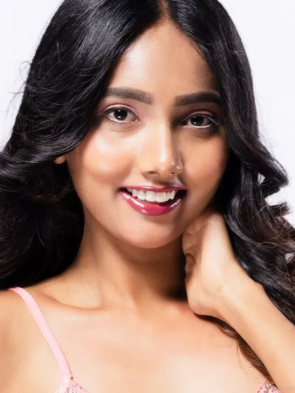 A smiling beauty close-up, capturing a moment of joy.