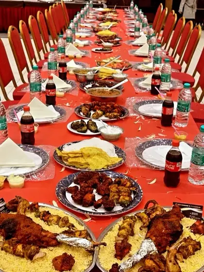 A stunning groom's table featuring two large platters of our special chicken Mandi biryani. This is a showstopper dish perfect for making a wedding feast unforgettable.
