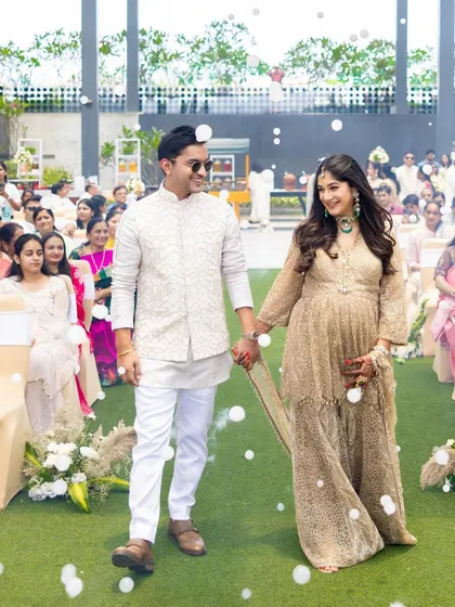 A magical entrance surrounded by bubbles. Her mama-to-be glow is enhanced with soft, elegant makeup.