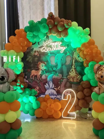 A complete view of the colorful jungle-themed second birthday, perfect for a home celebration.