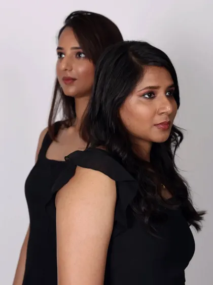 A striking portrait of two models from a group shoot. I created complementary makeup looks that enhanced their individual features while maintaining a unified, elegant style.