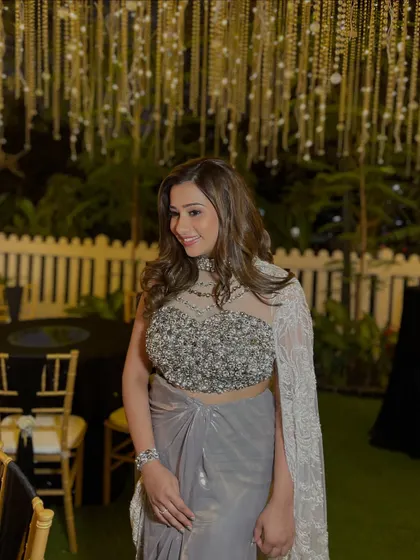Glowing under the fairy lights. This look is all about sheer glass skin and soft, radiant hues, creating a bold yet sexy style for her engagement party.