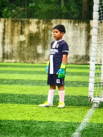 Our U11 goalkeeper, focused and ready between the posts during the Elite Grassroots Championships.
