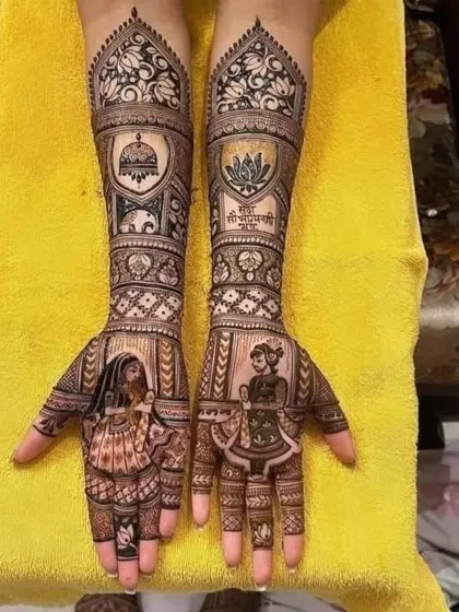A beautiful example of a full bridal design with couple portraits on the palms and auspicious mantras written in Hindi on the forearms.