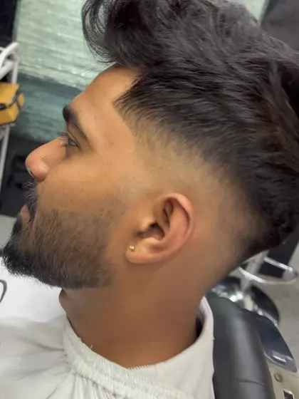 A sharp mid-fade with a textured top.
