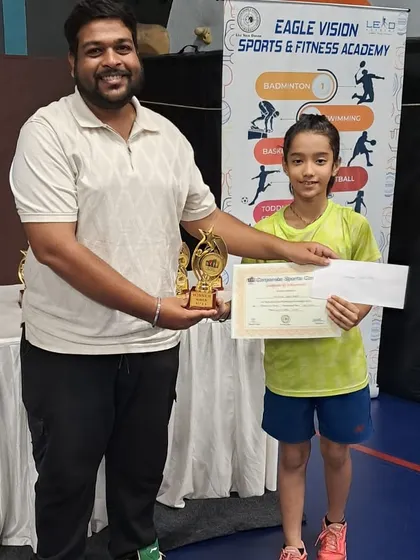 Nitika, our U-11 champion, being awarded her trophy. Her victory in this competitive category highlights the effectiveness of our structured training approach.