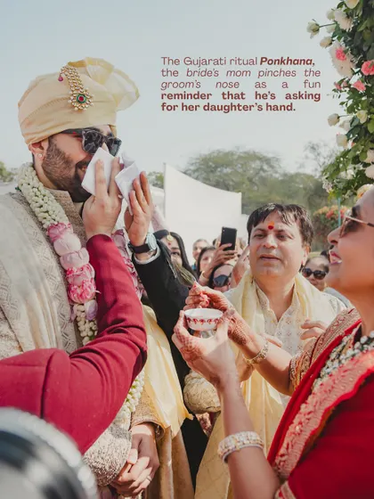 The playful Gujarati ritual of Ponkhana, where the bride's mother pinches the groom's nose. Capturing and making space for these fun, meaningful traditions is at the heart of what we do.