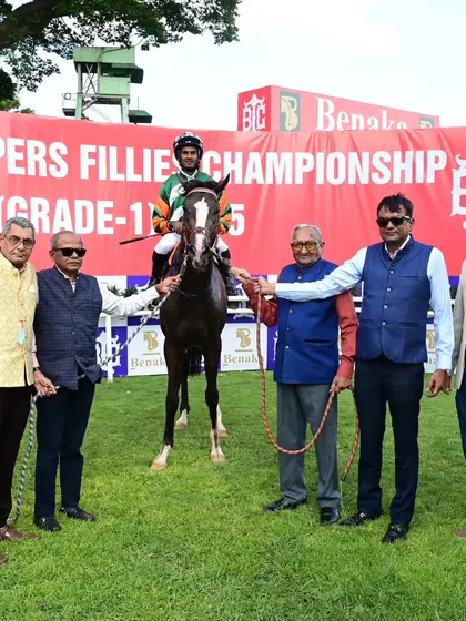 Sovereign King, winner of The Benaka Developers Karnataka Juvenile Million (GR III), with jockey Antony Raj.S.