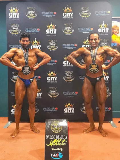 Backstage with my competition medals. Proud to represent India as a natural athlete.