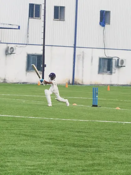 A young batter plays a shot during an Under-10 practice match on our astroturf ground. Giving our youngest players match experience is key to their development.