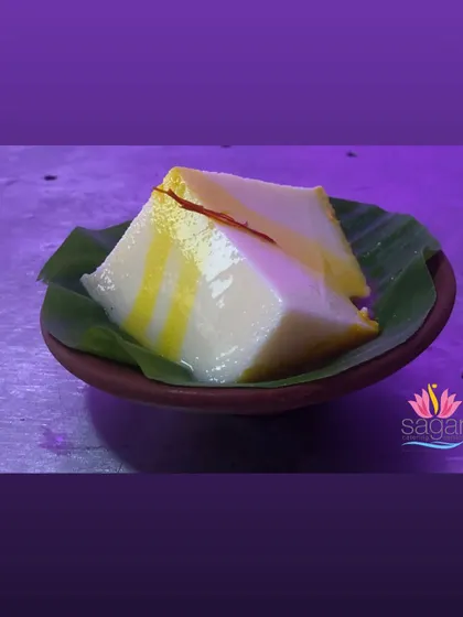 This is Kharvas, a traditional Maharashtrian milk pudding. Its delicate, jiggly texture and subtle sweetness make it a unique and beloved dessert, which I serve simply on a banana leaf.