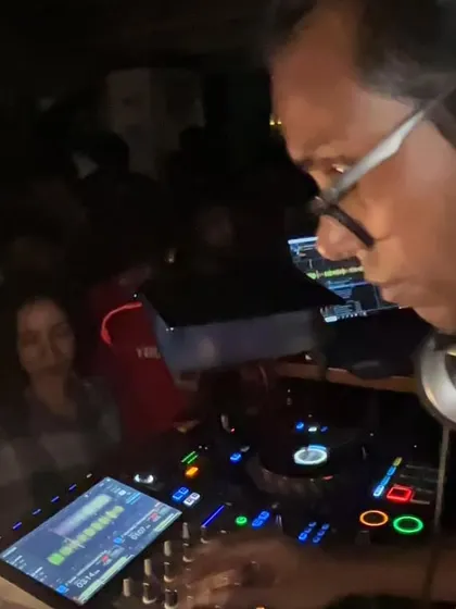 Deep in concentration, selecting the perfect track to mix in. Every song has its place in the journey of a DJ set.