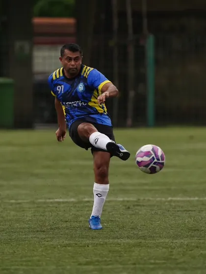 A player connects perfectly with the ball, showcasing the skill and precision we value. This is a glimpse into the action from our first win in the MFA Veterans league.