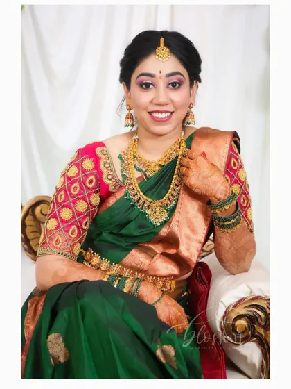 I love how this engagement photo turned out. The client's smile shows how comfortable and confident she feels in her perfectly draped saree, ready for her big event.