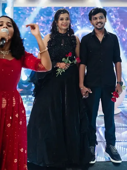 Our host on stage with the couple, guiding them through the evening's events. We provide end-to-end planning and hosting to ensure a smooth and seamless flow.