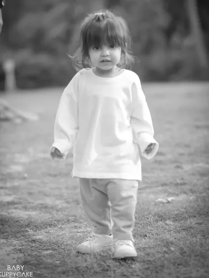 A solo shot of the little girl exploring the park on her own. We make sure to capture individual personalities too.