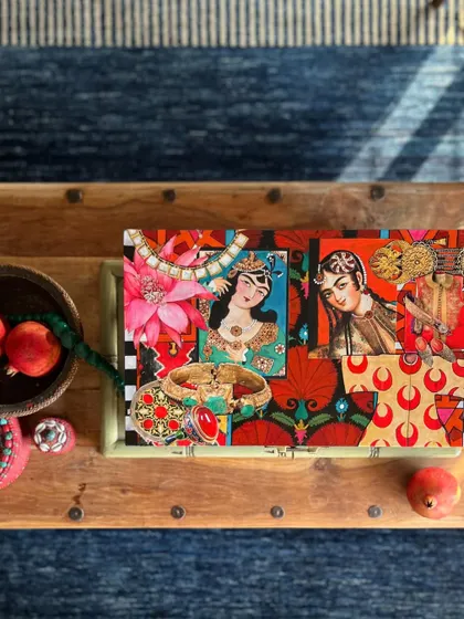 A top-down view of a memory box inspired by Seljuk and Turkish visual culture. The lid features a collage of Qajar-era portraits, Cintamani patterns, and floral motifs.