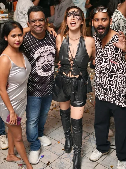 A fun group photo with some stylishly dressed friends.