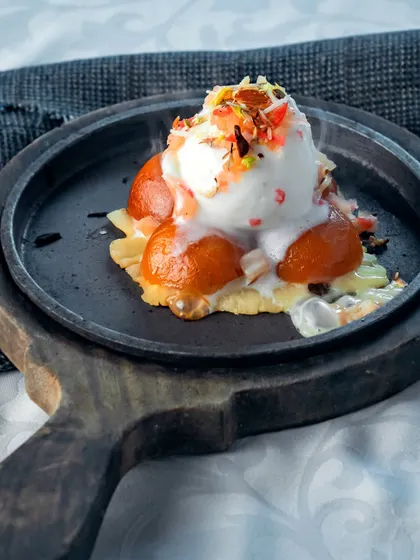 The ultimate in gluttony. End your meal with Sizzling Gulab Jamun for the sweetest possible note.
