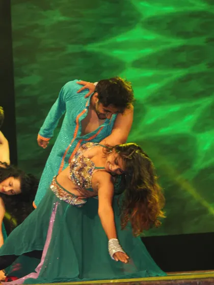A dynamic partner lift during a performance at Manch 23. My choreography often includes partner work to teach trust, connection, and advanced dance techniques.