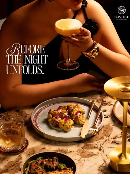 Before the night truly unfolds, there is a moment of quiet indulgence. I pair my craft cocktails with thoughtful plates, ensuring the first taste of the evening is a complete sensory experience.