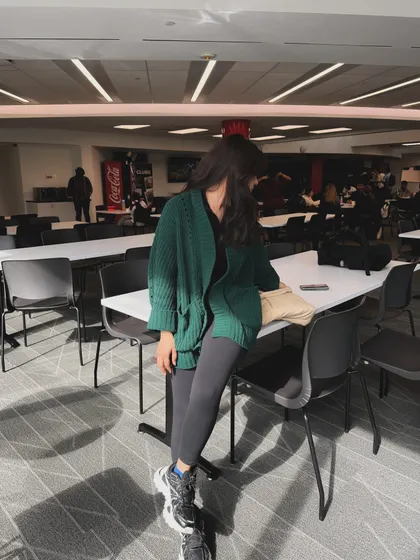 A full-body shot of my comfy study outfit in the college common area.